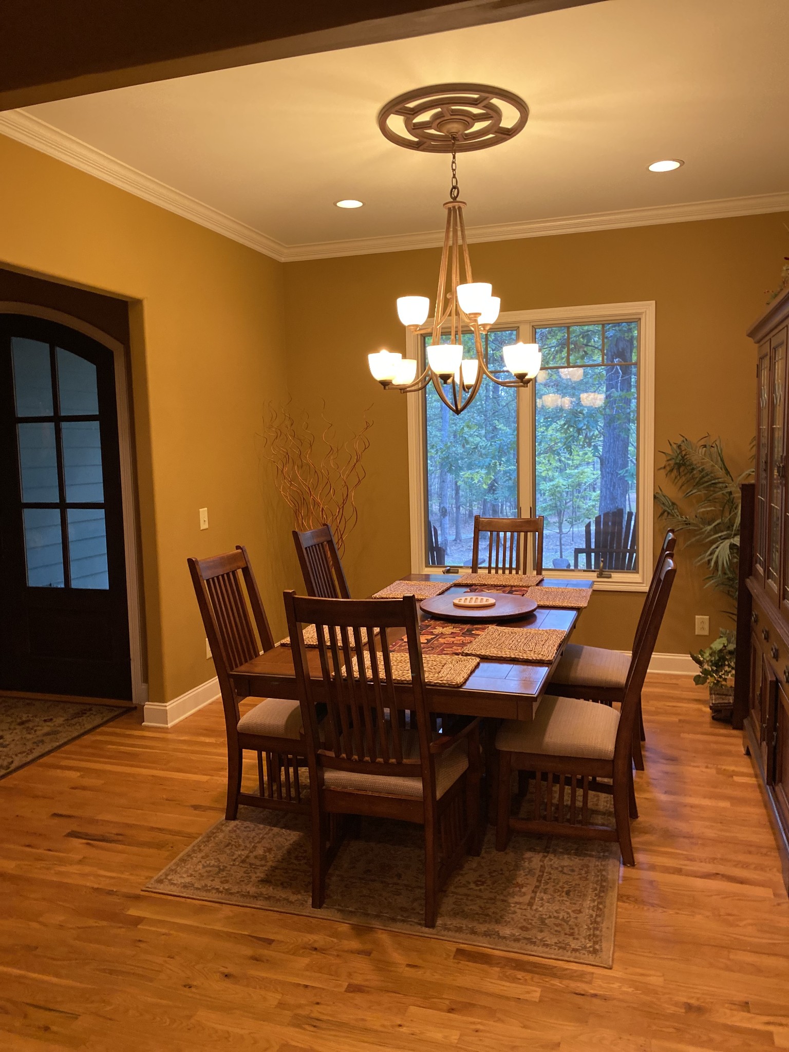 2271 Timberwood Trace Monteagle, TN 37356 - Photo 10 of 22 a dining room with furniture a chandelier and wooden floor