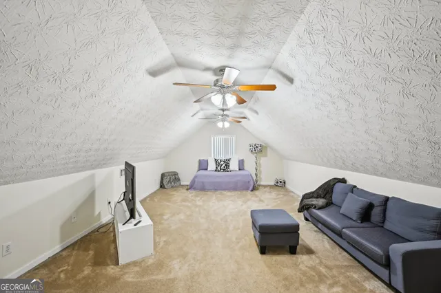 a view of entryway and livingroom