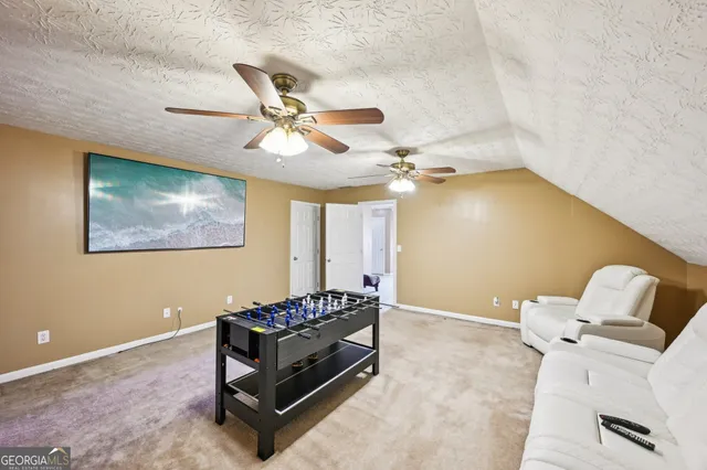 a house with swimming pool in front of it