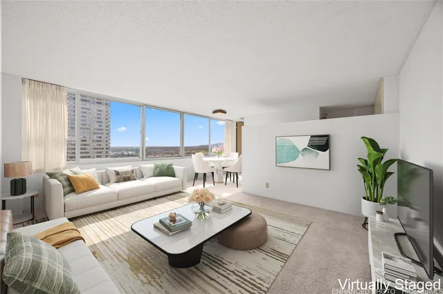 a living room with furniture and a couch