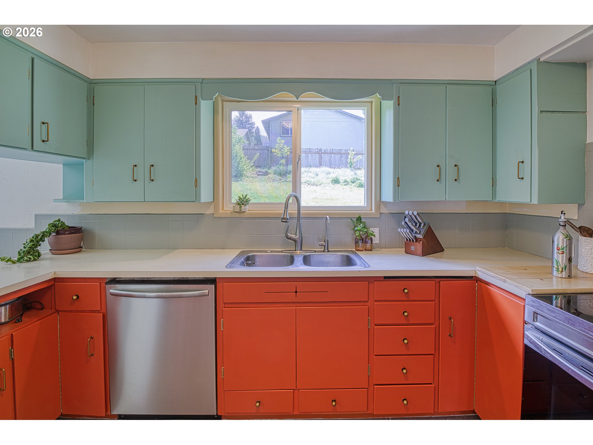 7077 Main Street Springfield, OR 97478 - Photo 7 of 34 a kitchen with a sink and a window