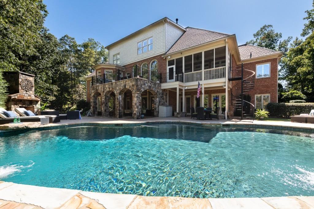 165 Autry Trail Alpharetta, GA 30022 - Photo 2 of 70 a view of a house with swimming pool