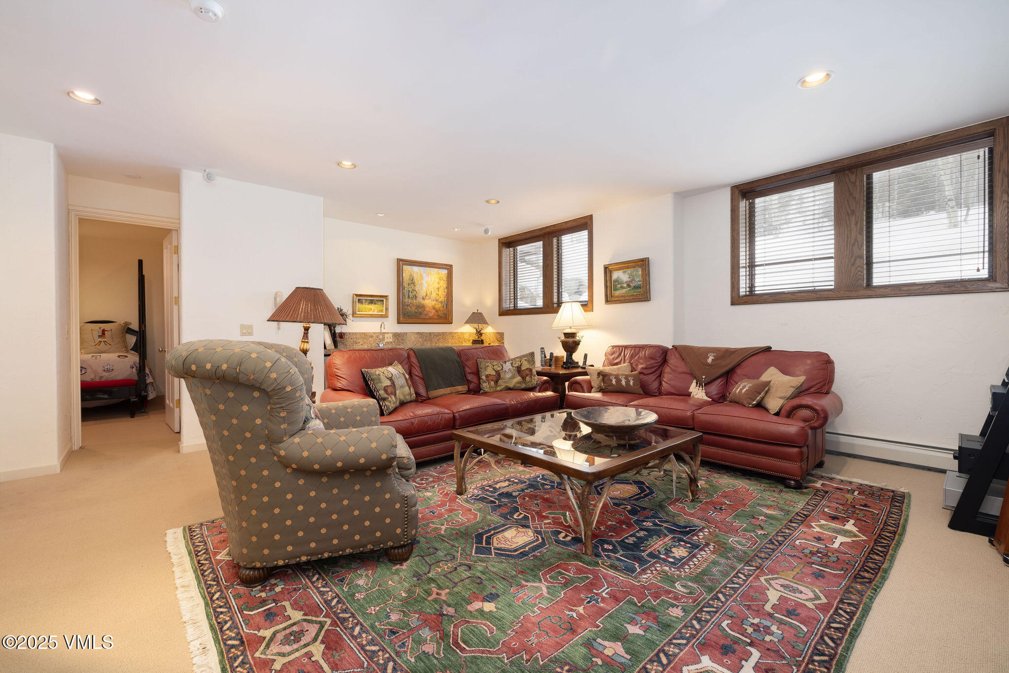 51 Hillside Court Edwards, CO 81632 - Photo 17 of 39 a living room with furniture potted plant and a window