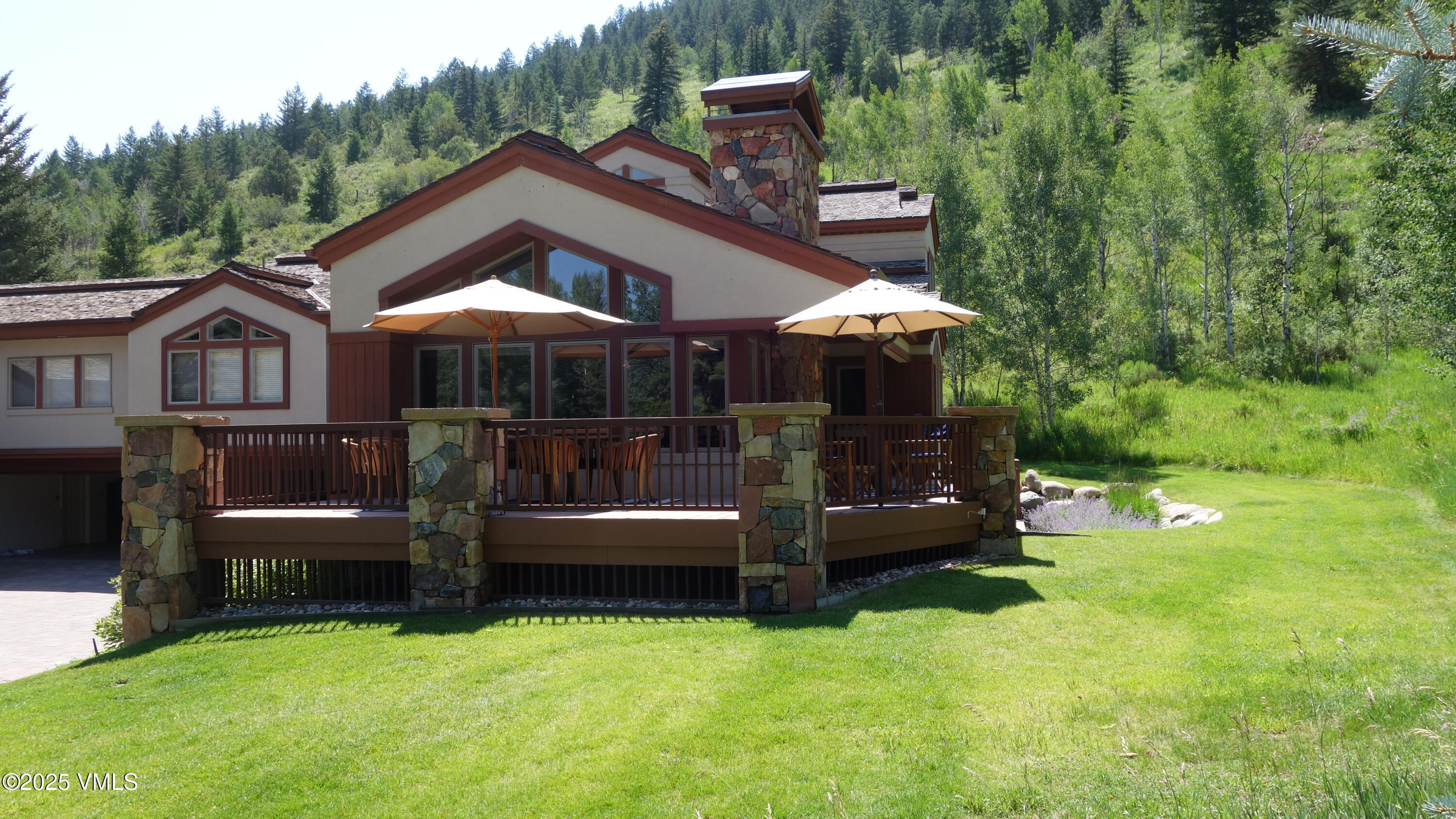 51 Hillside Court Edwards, CO 81632 - Photo 27 of 39 a view of a house with a yard chairs and iron fence