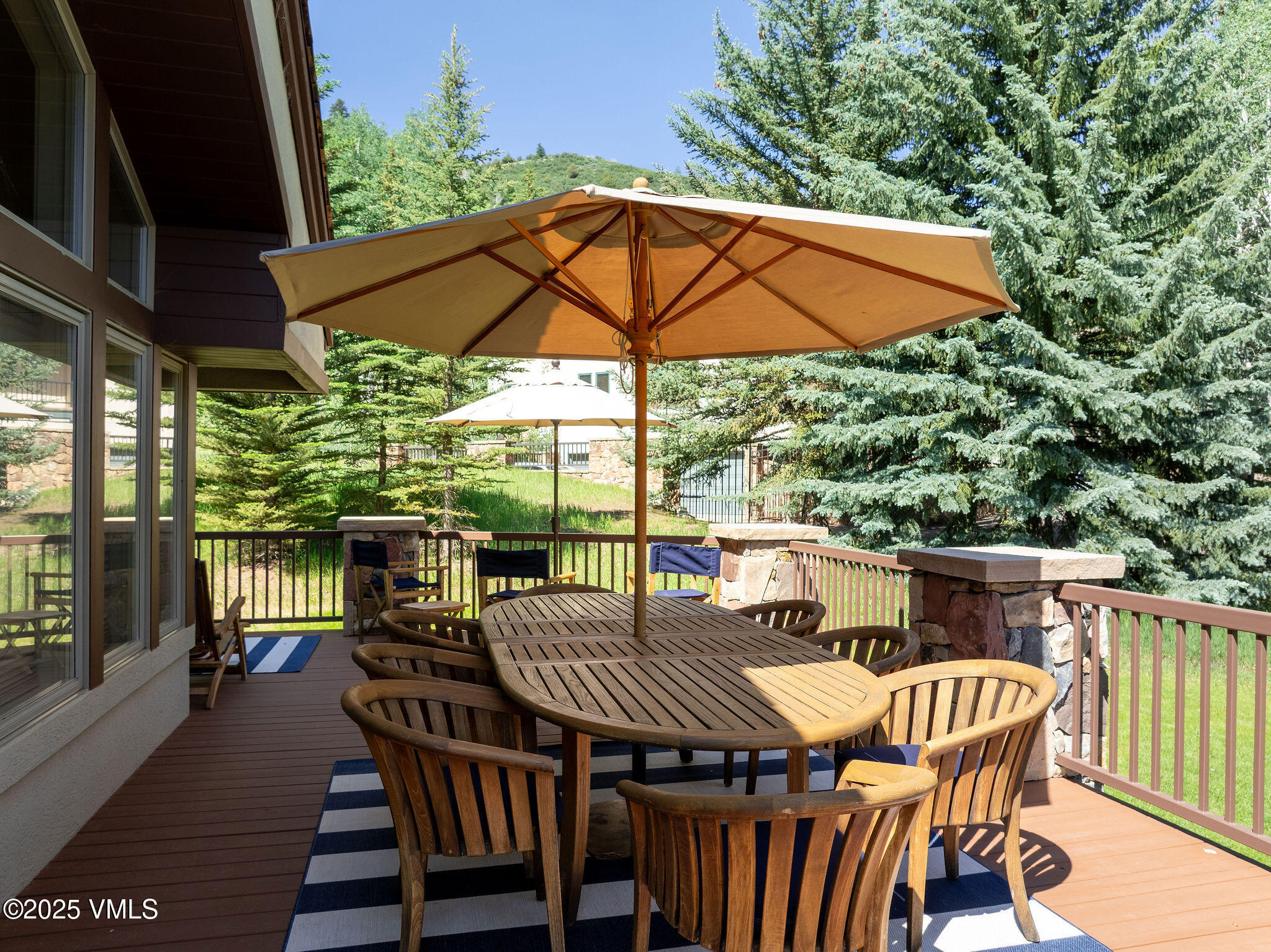 51 Hillside Court Edwards, CO 81632 - Photo 28 of 39 an outdoor space with furniture and umbrella