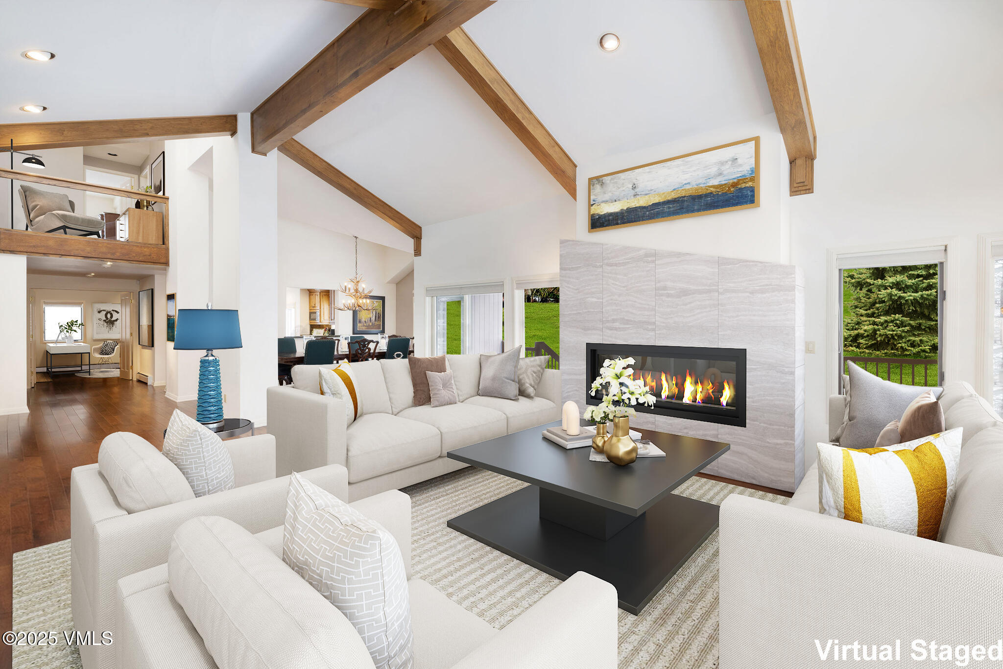 51 Hillside Court Edwards, CO 81632 - Photo 3 of 39 a living room with furniture and a fireplace