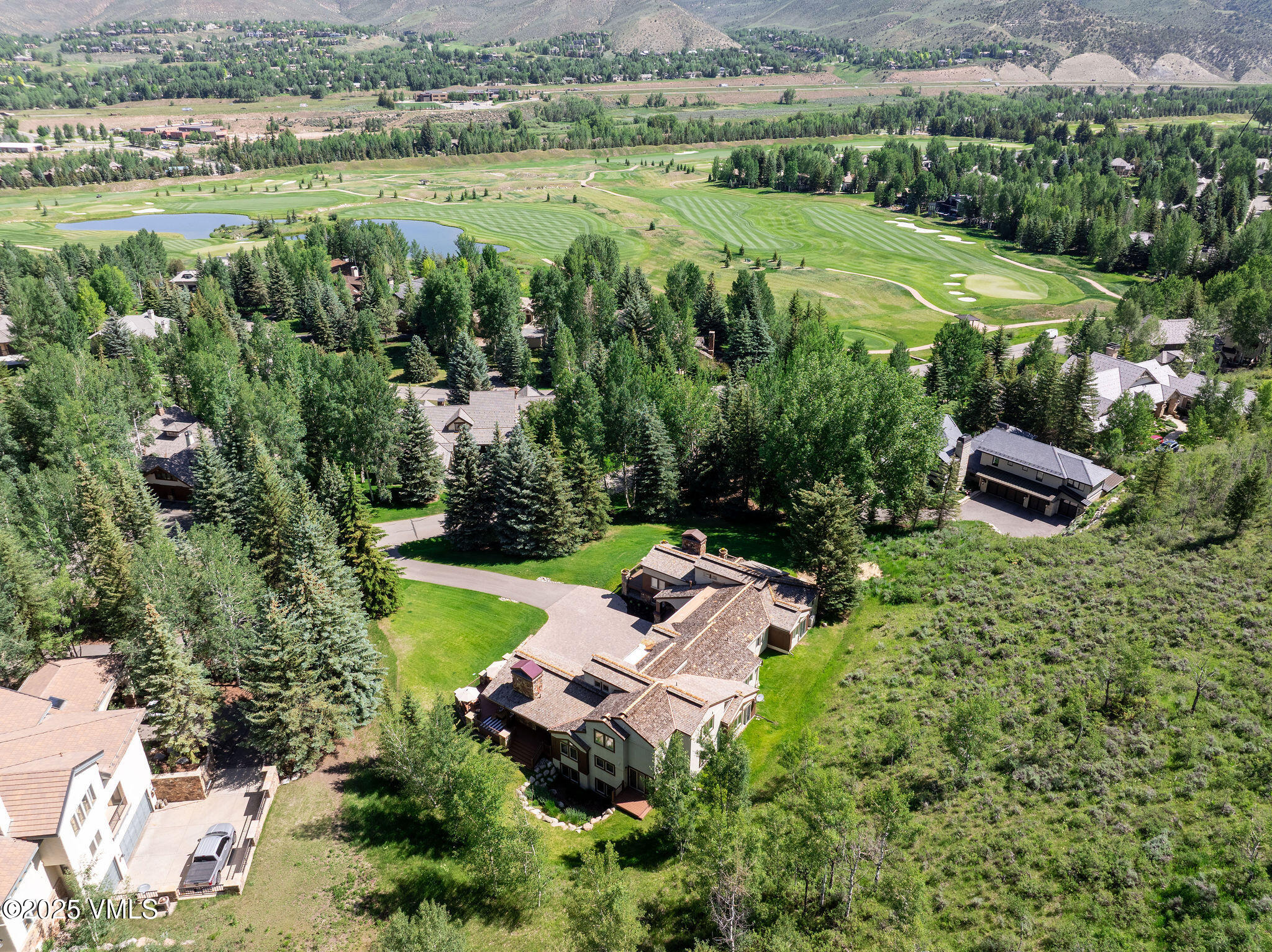 51 Hillside Court Edwards, CO 81632 - Photo 33 of 39 an aerial view of a house with a yard and lake view