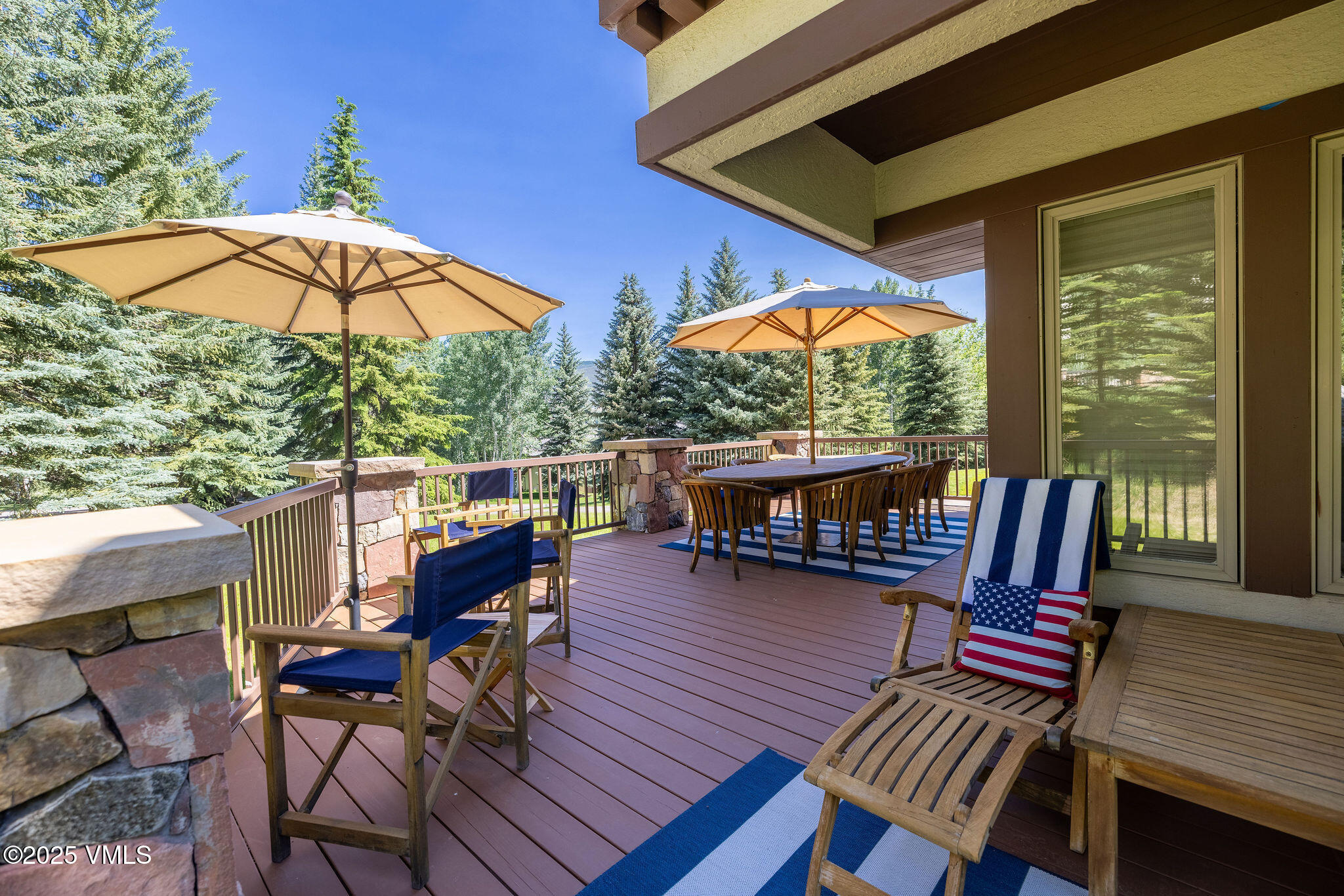 51 Hillside Court Edwards, CO 81632 - Photo 35 of 39 a view of a balcony with chairs and wooden floor