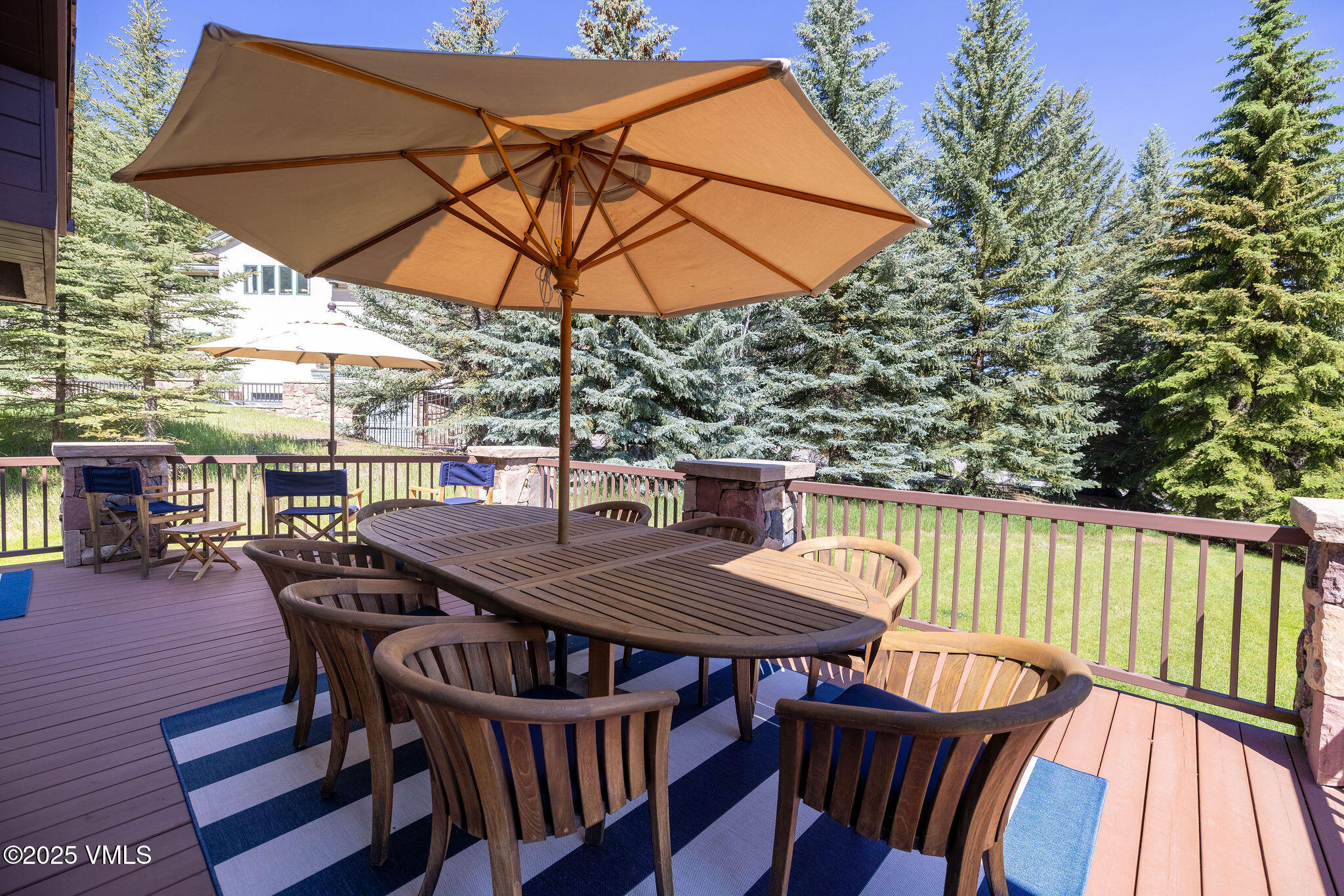 51 Hillside Court Edwards, CO 81632 - Photo 36 of 39 a view of a patio with a table and chairs under an umbrella