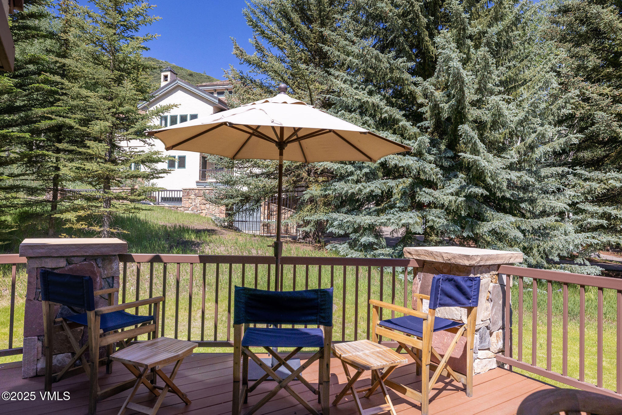 51 Hillside Court Edwards, CO 81632 - Photo 38 of 39 an outdoor space with furniture and umbrella