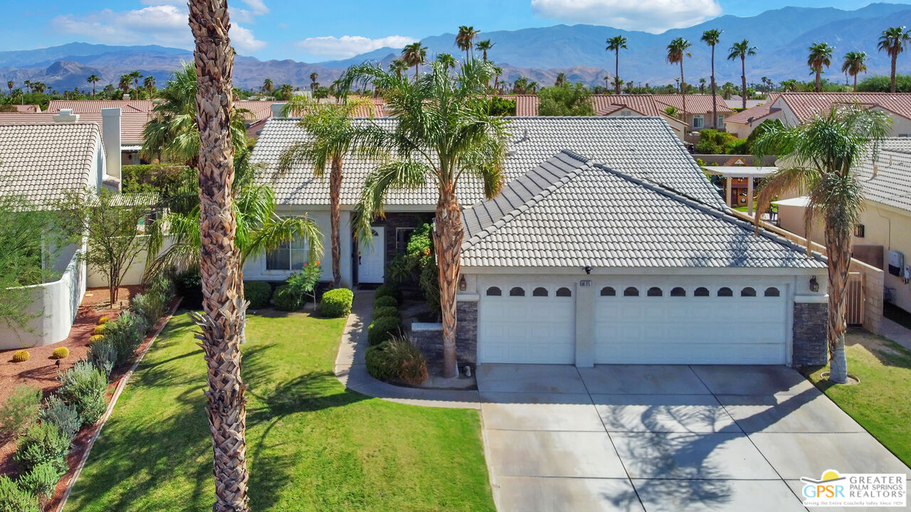 68315 Riviera Road Cathedral City, CA 92234 - Photo 1 of 33 a house view with a garden space