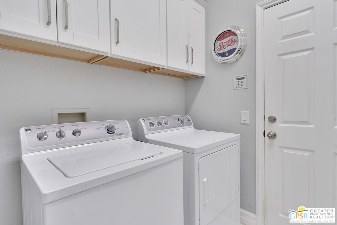 68315 Riviera Road Cathedral City, CA 92234 - Photo 20 of 33 a utility room with dryer and washer