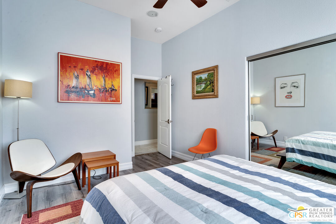 68315 Riviera Road Cathedral City, CA 92234 - Photo 23 of 33 a bedroom with furniture and a bed