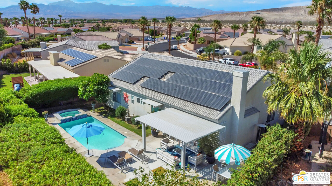 68315 Riviera Road Cathedral City, CA 92234 - Photo 33 of 33 an aerial view of a house with a garden