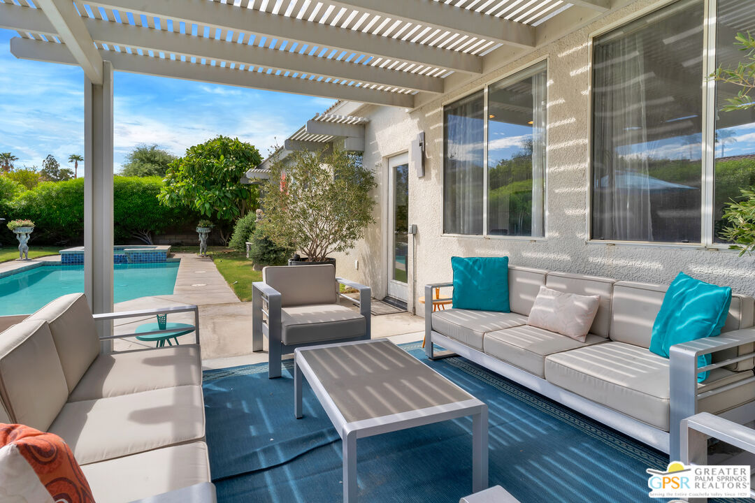 68315 Riviera Road Cathedral City, CA 92234 - Photo 5 of 33 a outdoor living space with furniture