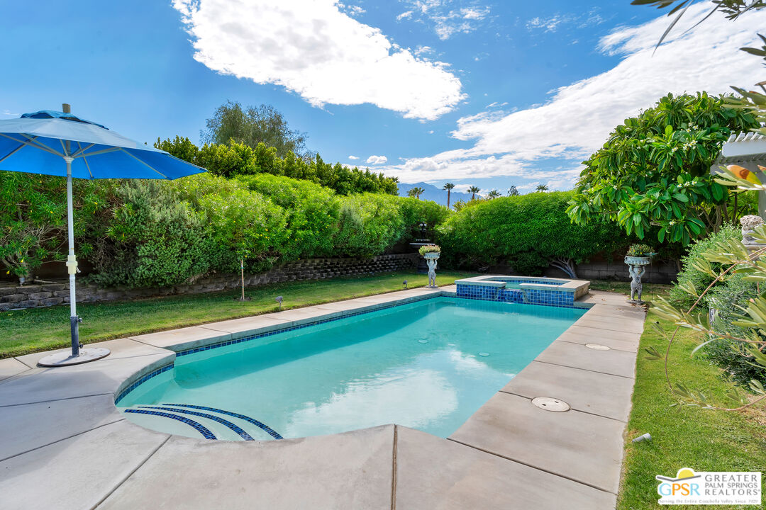 68315 Riviera Road Cathedral City, CA 92234 - Photo 8 of 33 a view of a backyard with a swimming pool