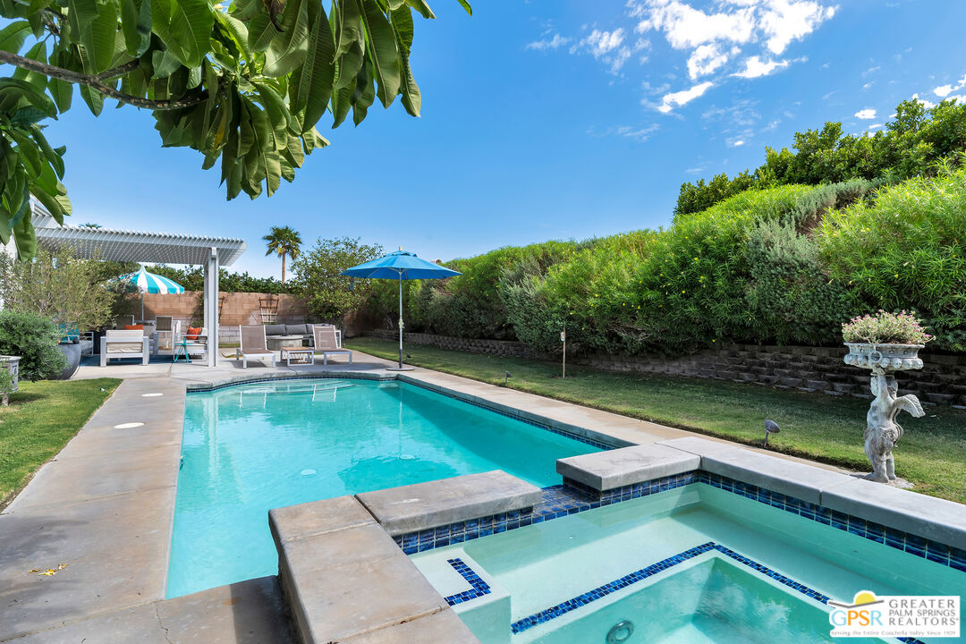 68315 Riviera Road Cathedral City, CA 92234 - Photo 9 of 33 a view of a swimming pool with lounge chair