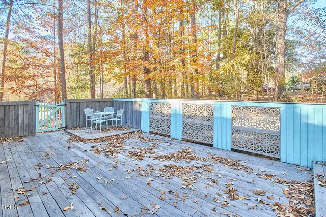 a floor to ceiling window with garden view