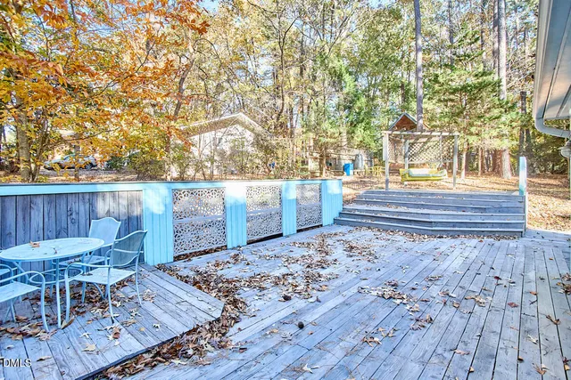 a view of a backyard of the house