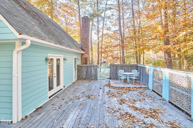 a view of a backyard with sitting area
