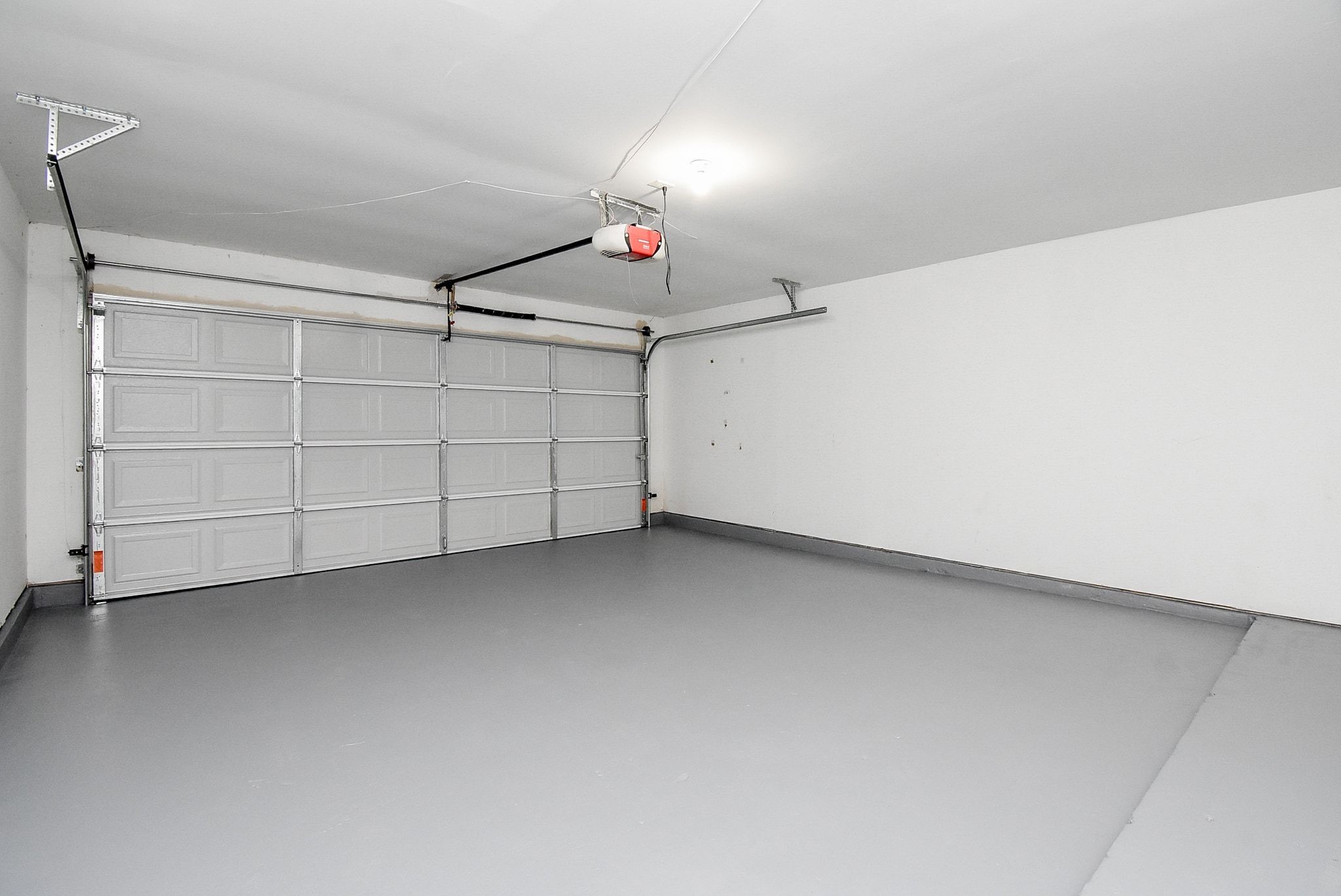 17330 Modbury Drive Spring, TX 77379 - Photo 25 of 30 Very spacious and recently painted garage flooring and new garage door!