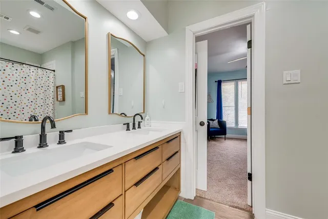 a bedroom with a bed and furniture