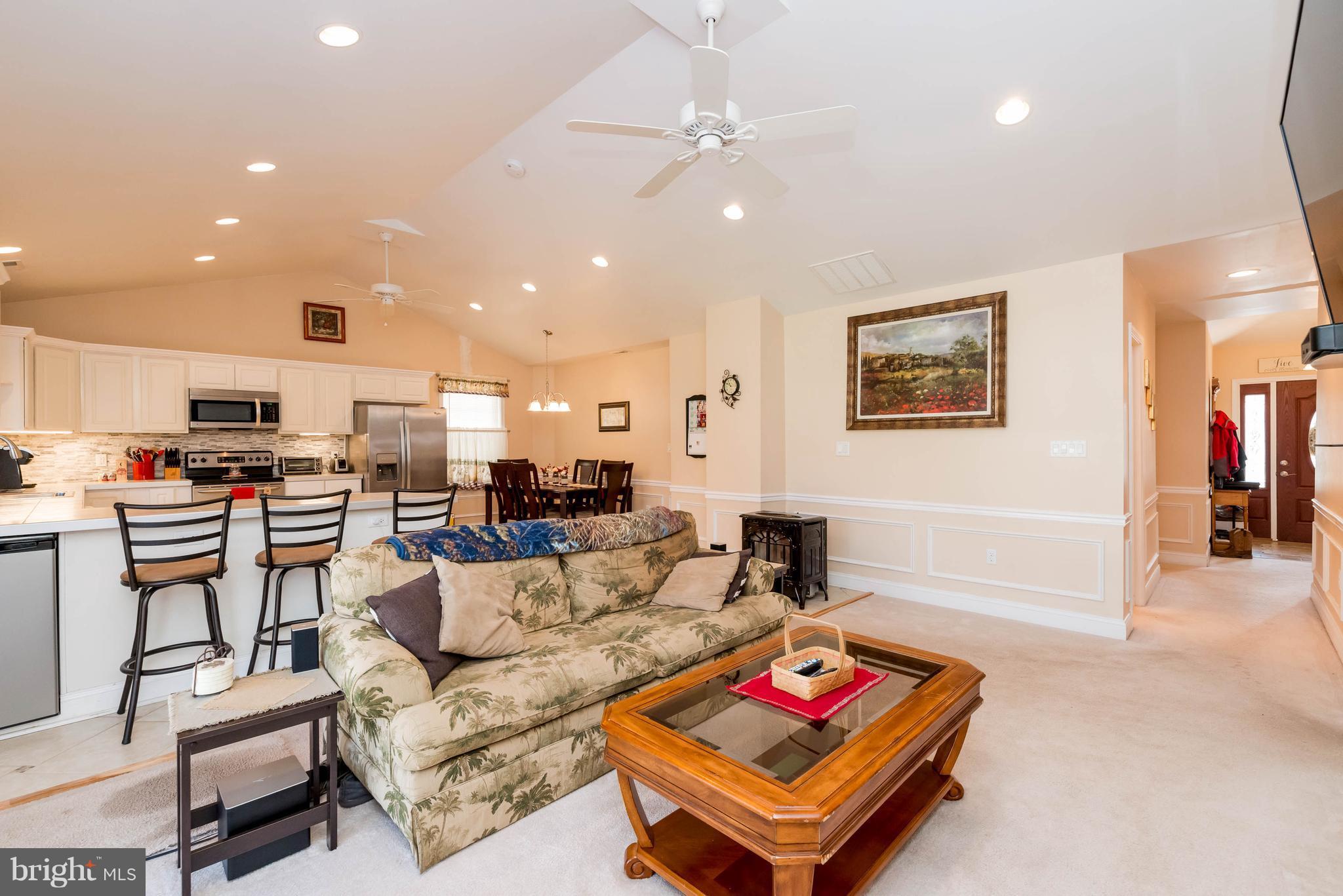 28 Brookfield Road Pasadena, MD 21122 - Photo 12 of 28 Family Room has cathedral ceilings and fans