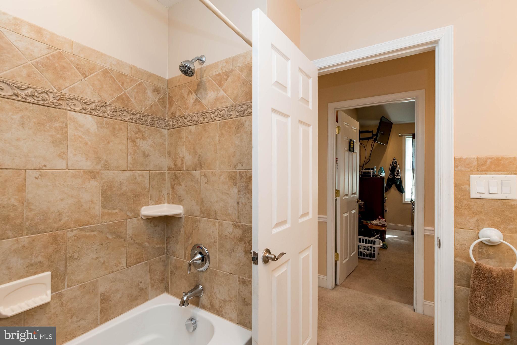 28 Brookfield Road Pasadena, MD 21122 - Photo 20 of 28 Bath beautifully up graded ceramic shower