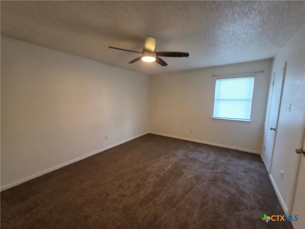 3409 Victoria Circle, Unit 4 Killeen, TX 76543 - Photo 8 of 10 an empty room with a window and a fan