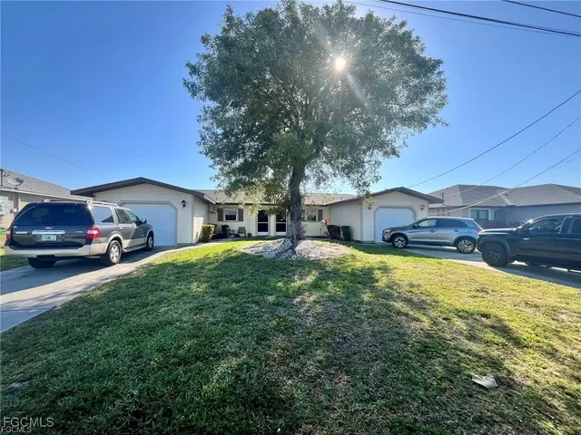 a house view with a garden space