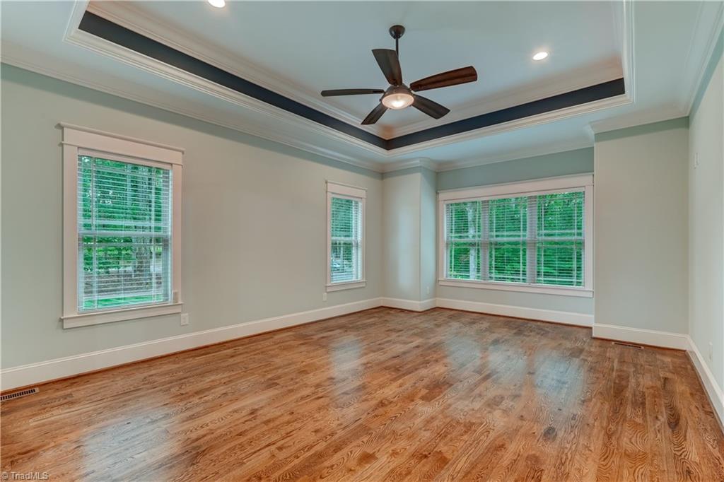 2733 Pleasant Ridge Road Summerfield, NC 27358 - Photo 22 of 41 Primary bedroom