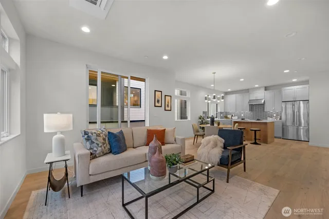 a living room with furniture and a table