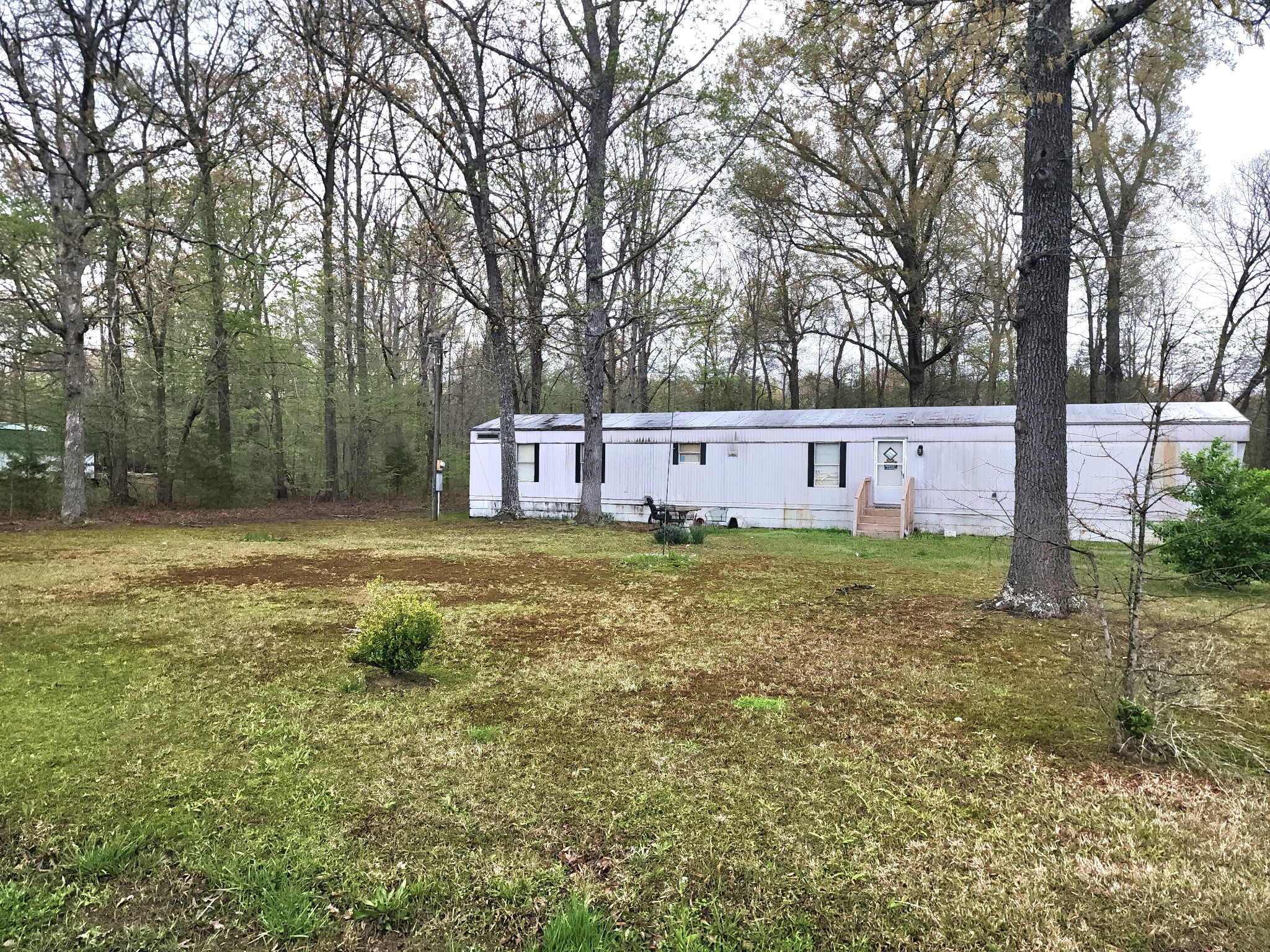 97 Lloyd Boynton Road Manchester, TN 37355 - Photo 2 of 2 a view of a house with a yard