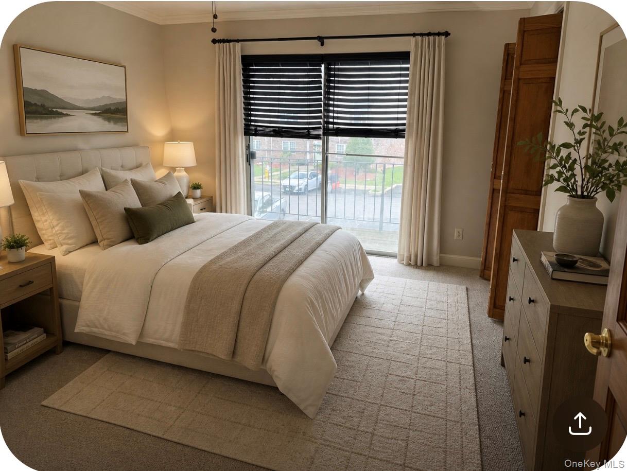 276 Temple Hill Road, Unit 1704 New Windsor, NY 12553 - Photo 12 of 22 a bedroom with a bed a window and a flat screen tv