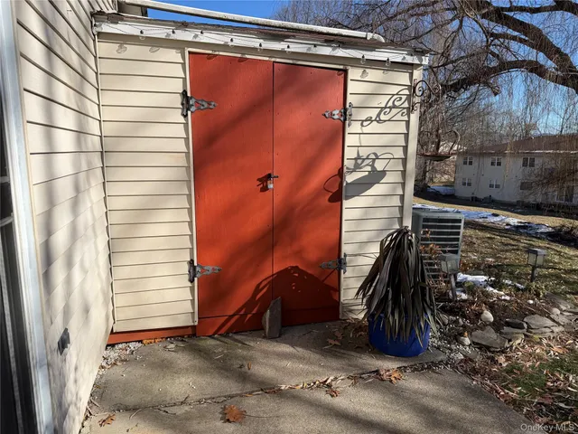 a view of a house with a wooden door