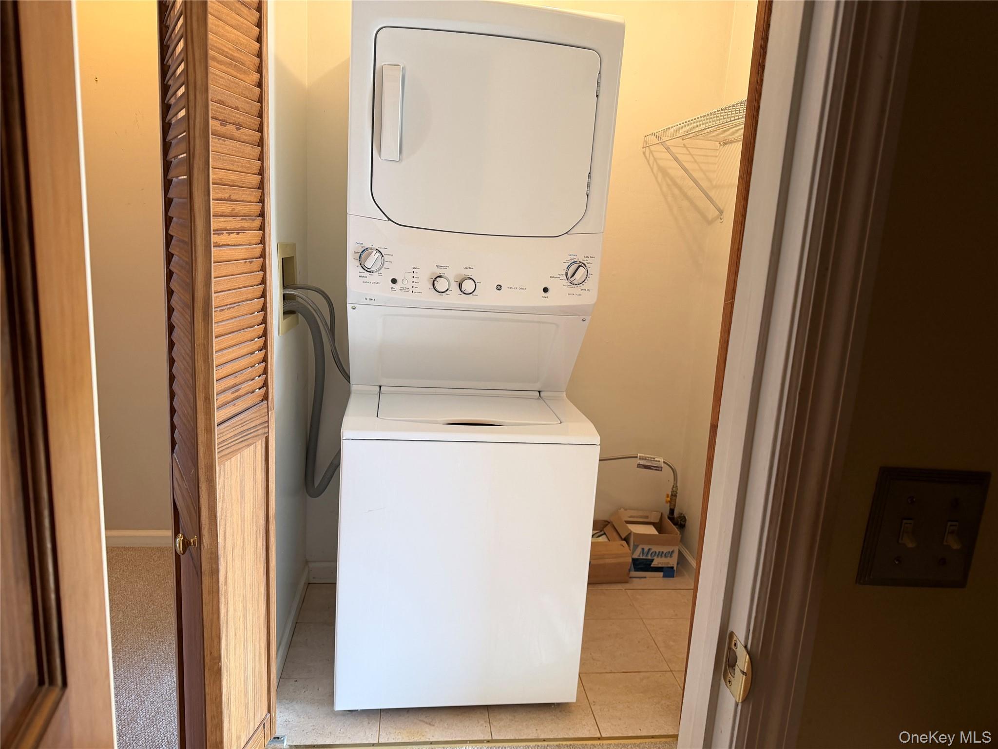 276 Temple Hill Road, Unit 1704 New Windsor, NY 12553 - Photo 16 of 22 a utility room with dryer and washer