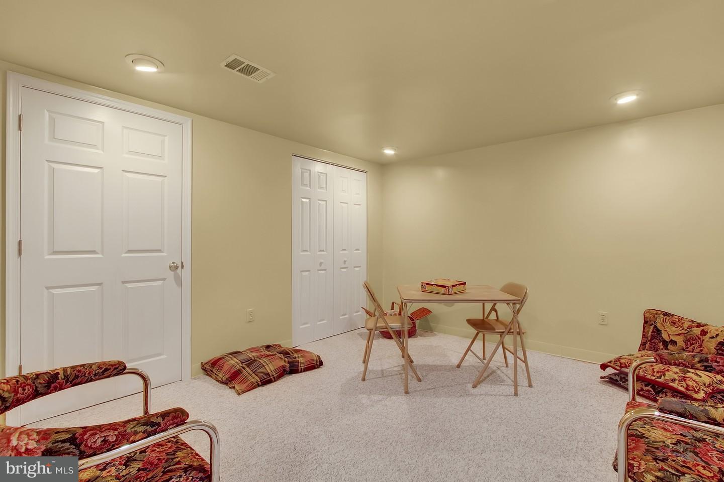 Center Street, Unit 177 Hanover, PA 17331 - Photo 18 of 26 Family Room Lower Level - doors to Laundry/Storage