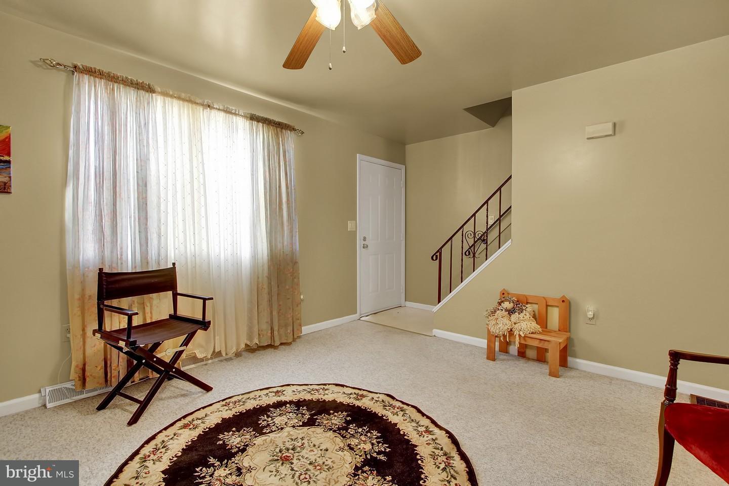 Front of Home & Stairway to Bedrooms
