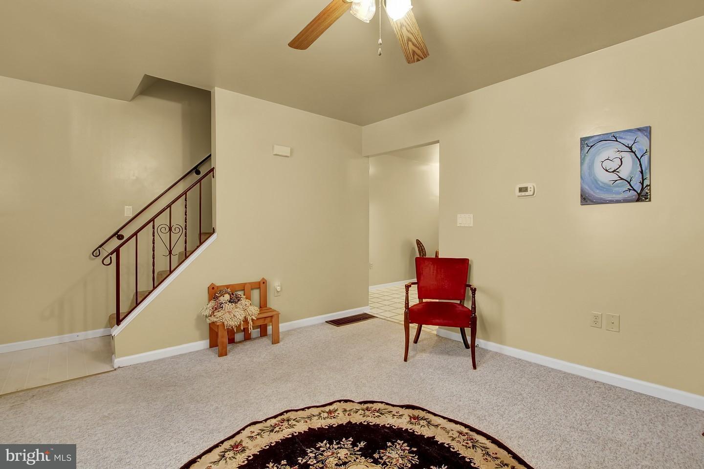 Living Room-Stairs to Upstairs-Archway to Kitchen