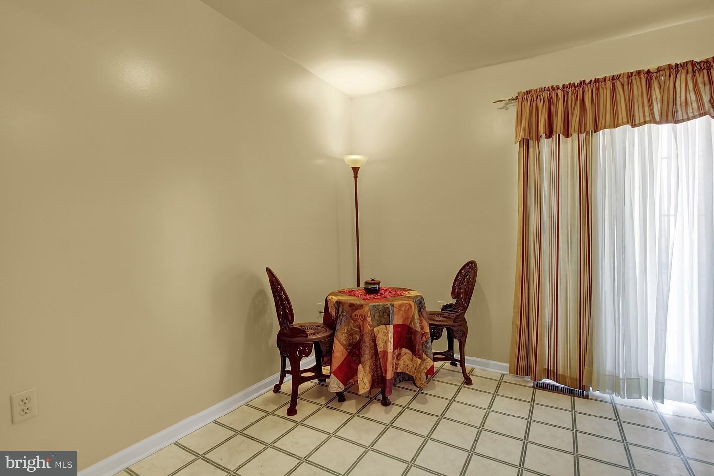 Dining Area in Kitchen with Patio Doors to Deck