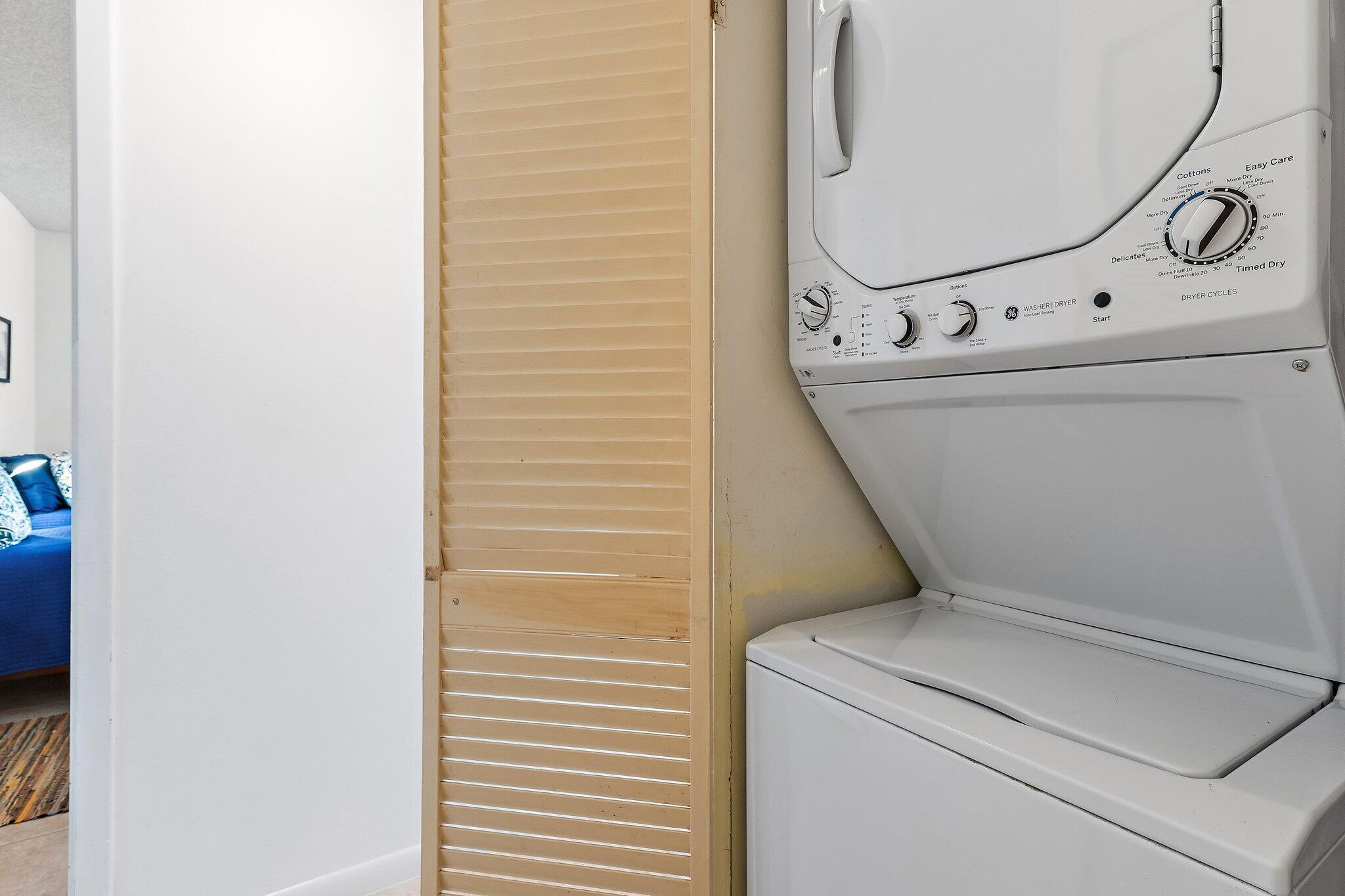353 Highway 1, Unit C7 Jupiter, FL 33477 - Photo 19 of 45 a utility room with dryer and washer