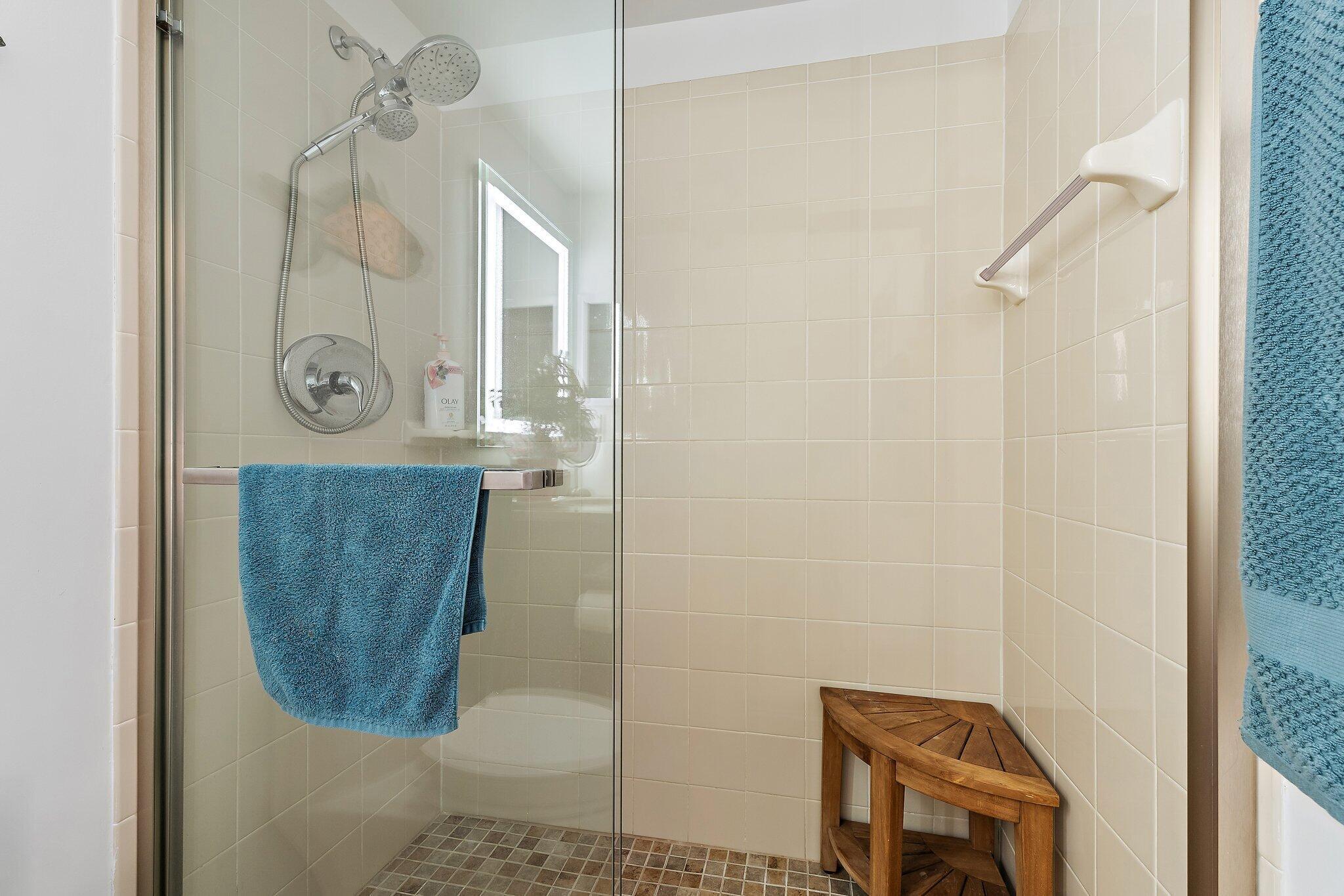 353 Highway 1, Unit C7 Jupiter, FL 33477 - Photo 25 of 45 a bathroom with a shower