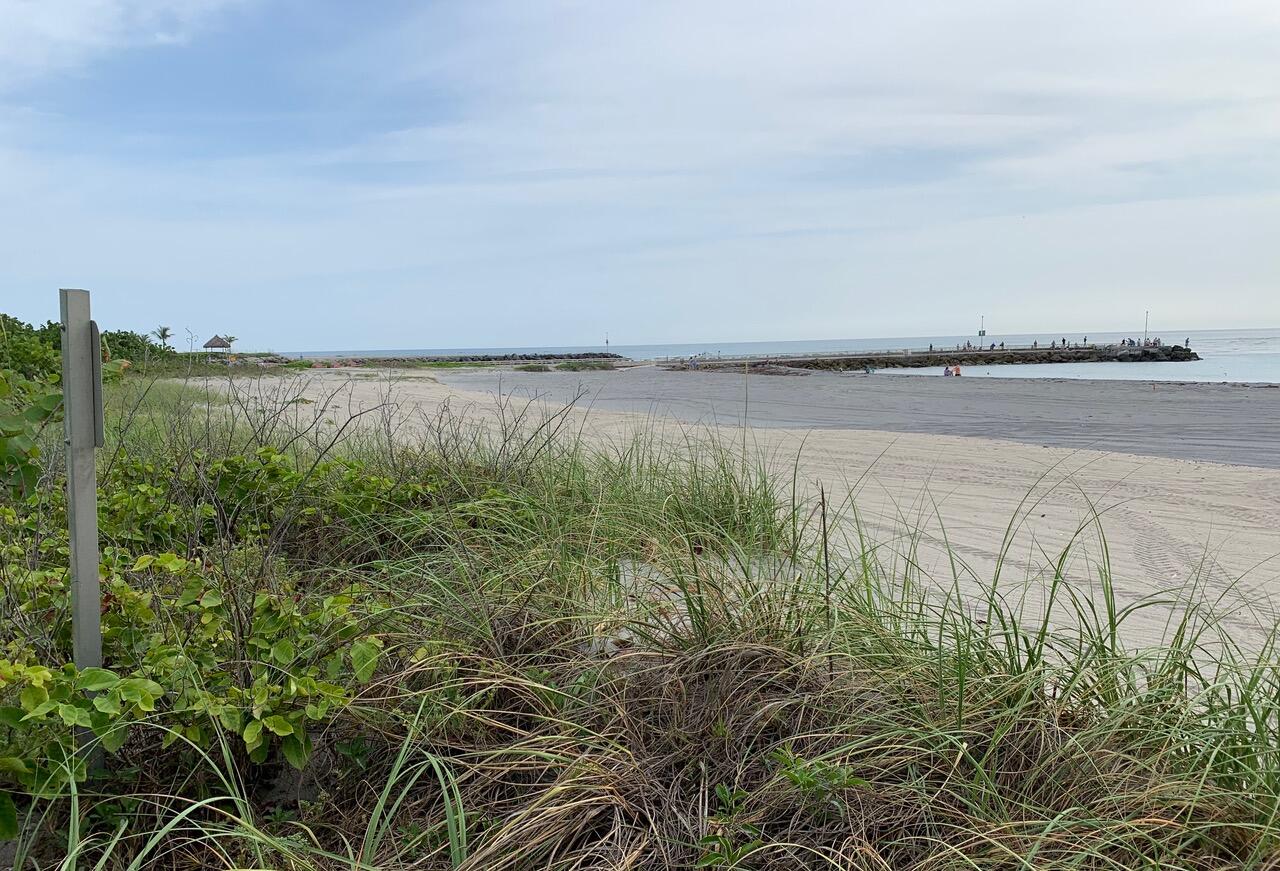 353 Highway 1, Unit C7 Jupiter, FL 33477 - Photo 45 of 45 a view of a lake from a yard