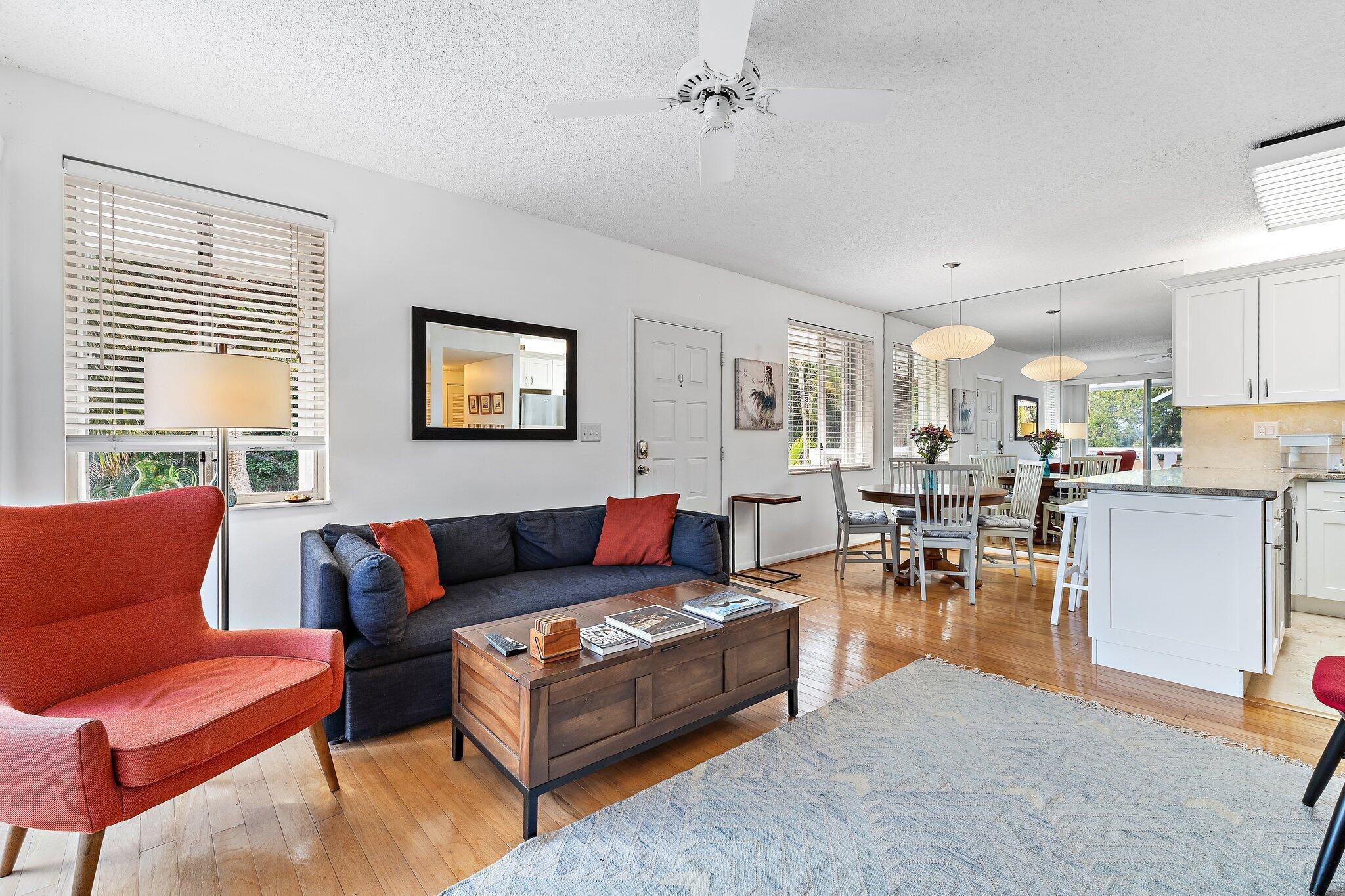 353 Highway 1, Unit C7 Jupiter, FL 33477 - Photo 6 of 45 a living room with furniture and a large window
