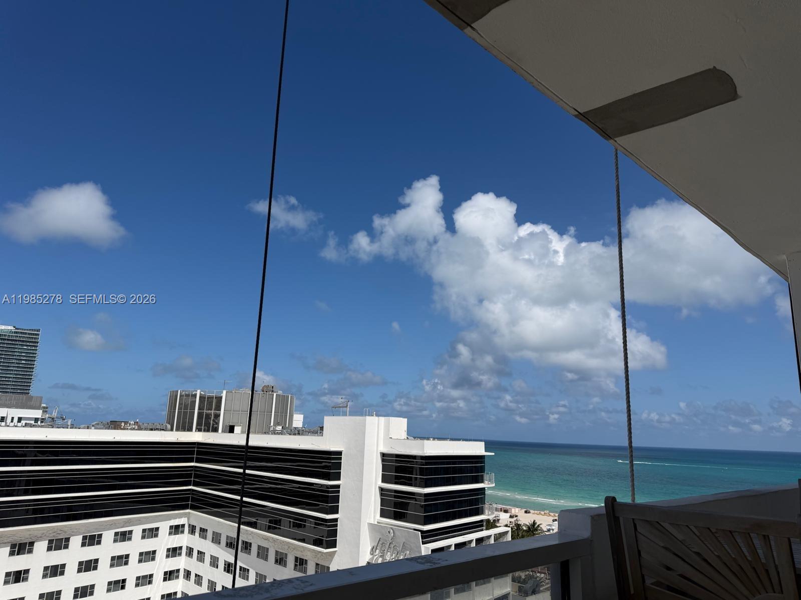 100 Lincoln Road, Unit 1512 Miami Beach, FL 33139 - Photo 11 of 21 a kitchen with cabinets and appliances
