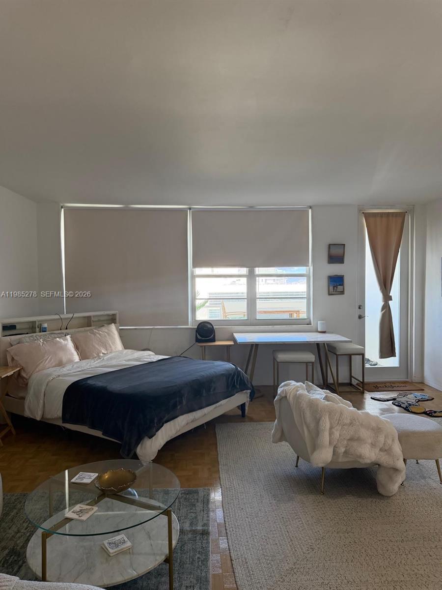 100 Lincoln Road, Unit 1512 Miami Beach, FL 33139 - Photo 3 of 21 a bedroom with bed and window