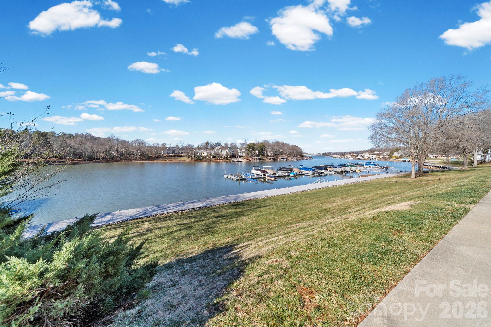 529 Catspaw Road Statesville, NC 28677 - Photo 1 of 48 a view of a lake with houses in the back