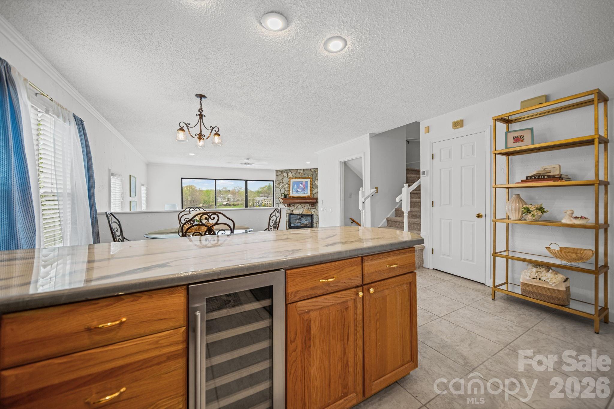 529 Catspaw Road Statesville, NC 28677 - Photo 12 of 48 a view of cabinets a sink and a wooden floor
