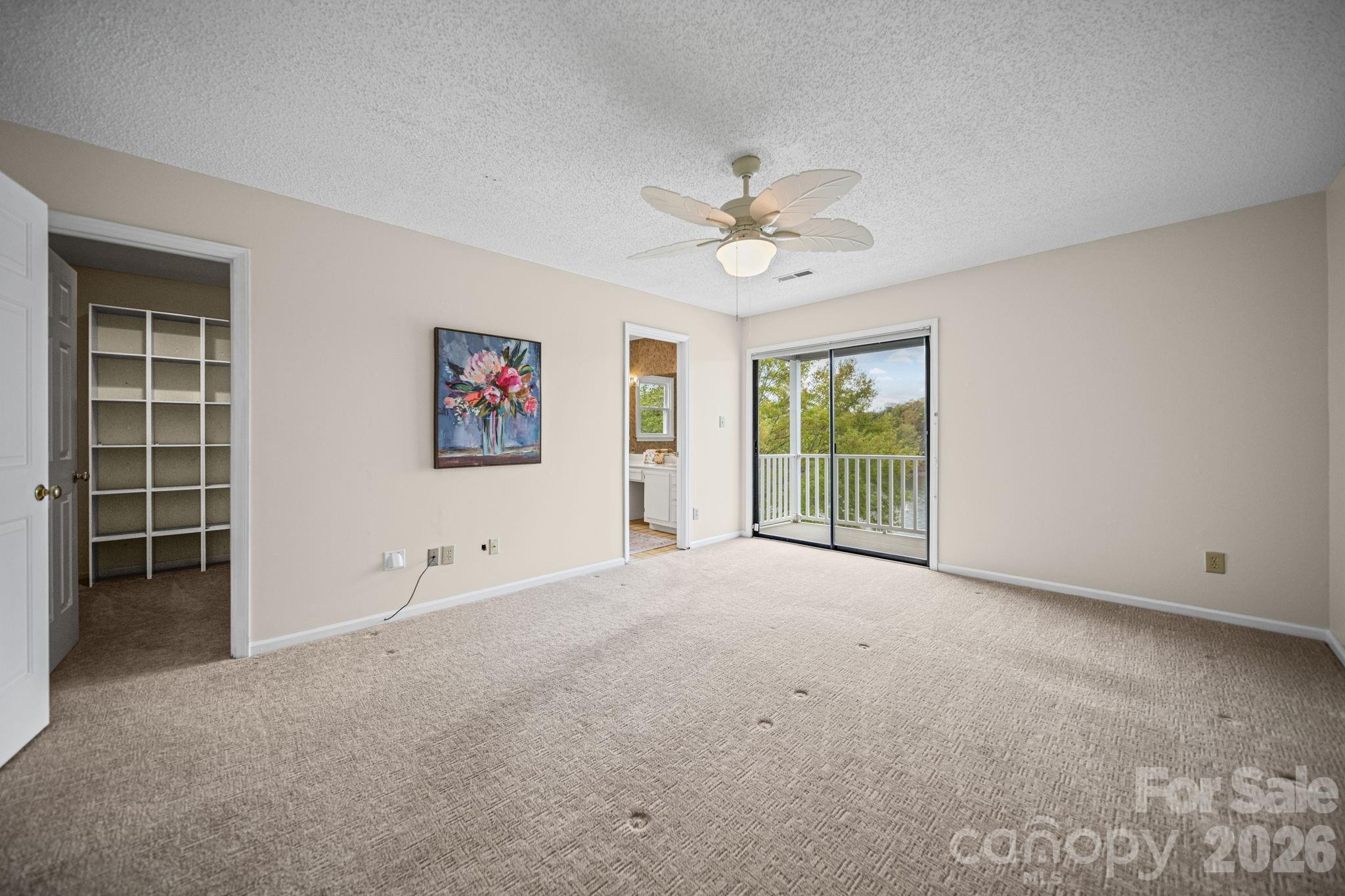 529 Catspaw Road Statesville, NC 28677 - Photo 16 of 48 a view of an empty room with a window