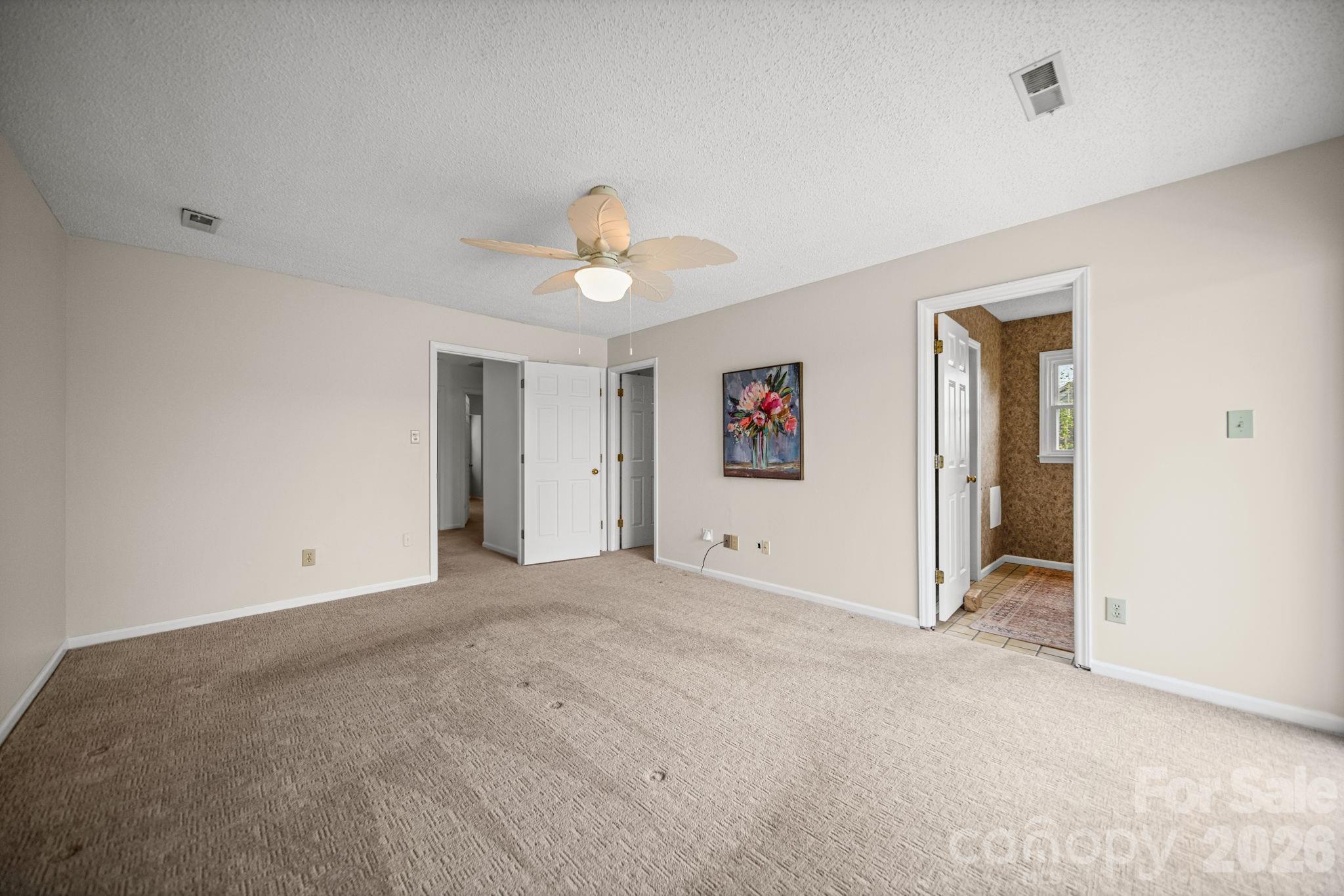 529 Catspaw Road Statesville, NC 28677 - Photo 19 of 48 a view of an empty room with a window